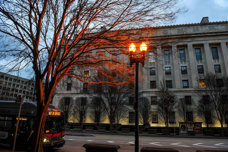 The U.S. Department of Justice building is bathed in morning light at sunrise in Washington