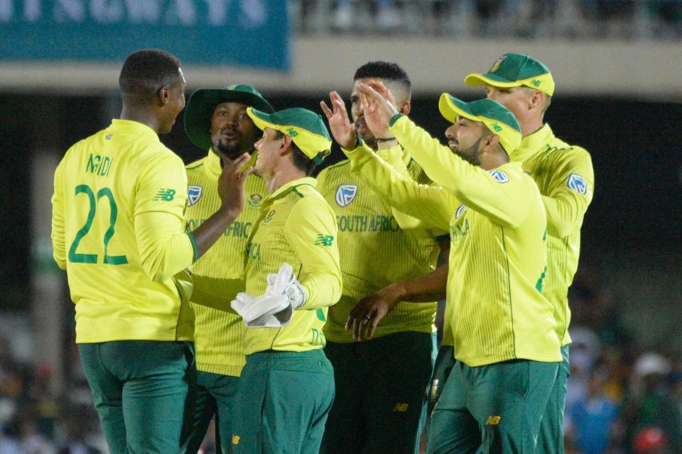 South Africa's Lungi Ngidi celebrates with teammates after catching out England's Jason Roy: AFP via Getty Images