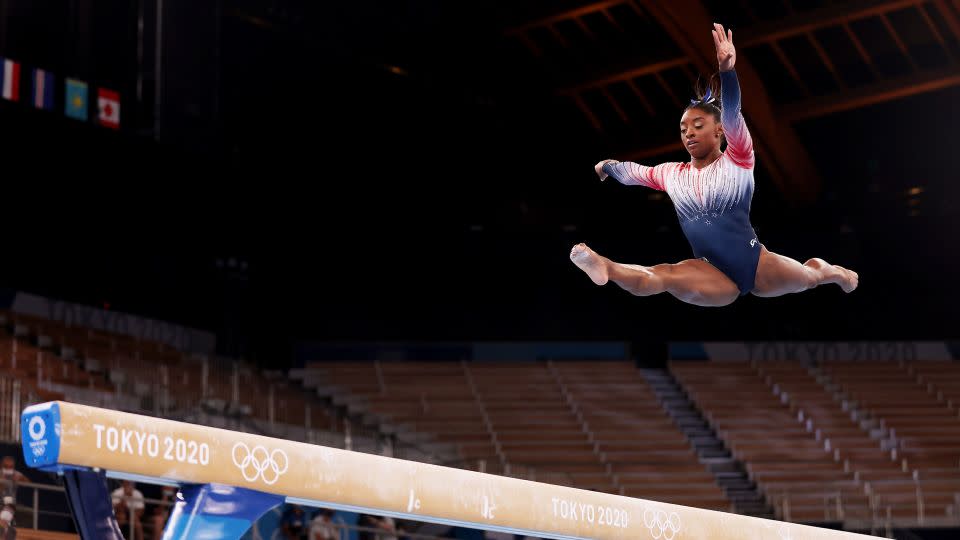 Biles competes in the balance beam final at the Tokyo 2020 Olympic Games. - Jamie Squire/Getty Images