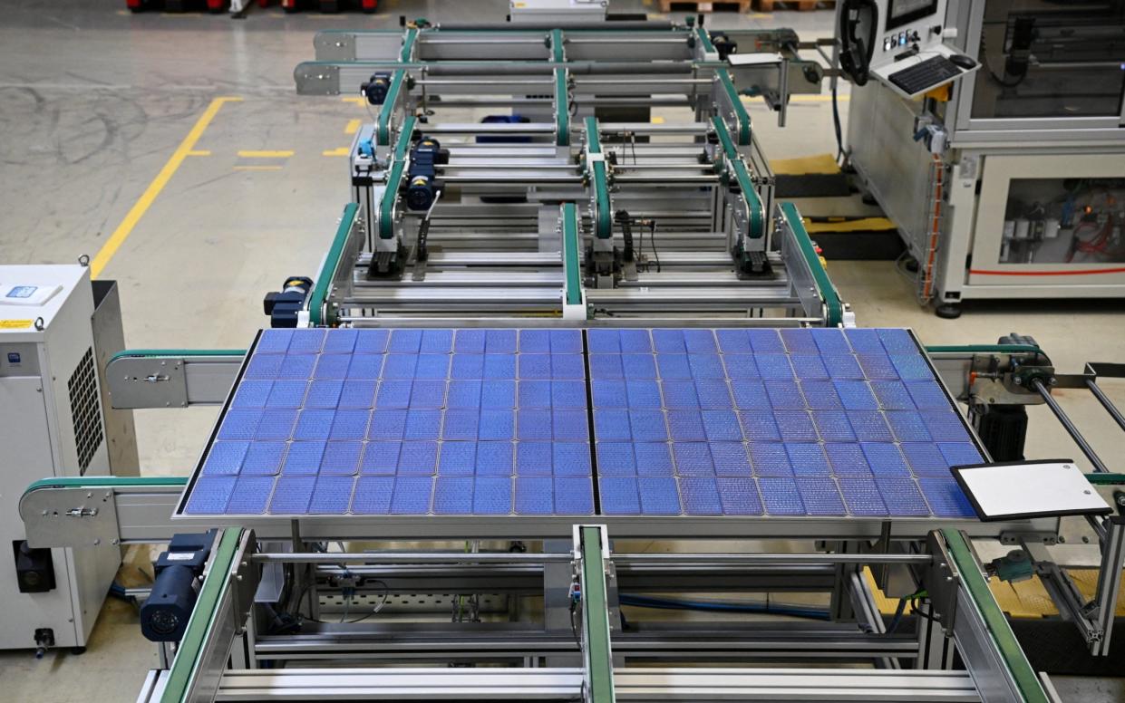 A solar panel rolls off the assembly line at a Meyer Burger factory in Germany