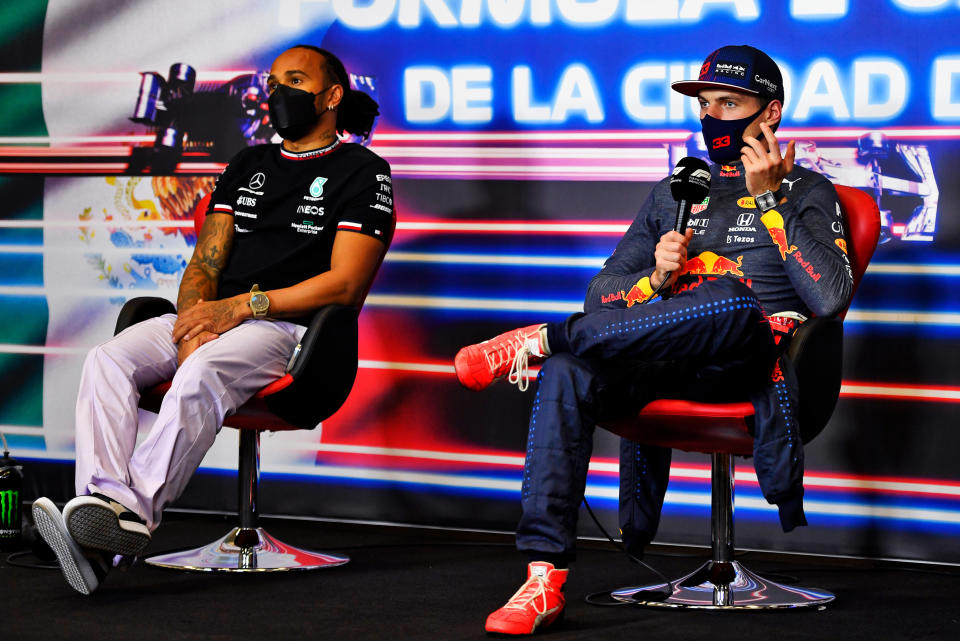 MEXICO CITY, MEXICO - NOVEMBER 07: Race winner Max Verstappen of Netherlands and Red Bull Racing and second placed Lewis Hamilton of Great Britain and Mercedes GP talk in a press conference after the F1 Grand Prix of Mexico at Autodromo Hermanos Rodriguez on November 07, 2021 in Mexico City, Mexico. (Photo by Rudy Carezzevoli - Pool/Getty Images)