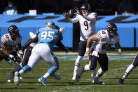 Chicago Bears quarterback Nick Foles (9) reaches for the ball during the first half of an NFL football game against the Carolina Panthers in Charlotte, N.C., Sunday, Oct. 18, 2020. (AP Photo/Mike McCarn)