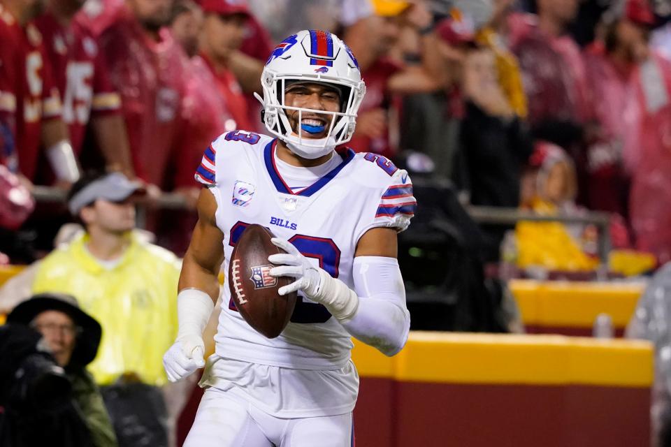 Buffalo Bills safety Micah Hyde celebrates after running an interception back for a touchdown during the second half of an NFL football game against the Kansas City Chiefs Sunday, Oct. 10, 2021, in Kansas City, Mo.