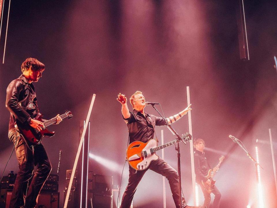 Queens of the Staone Age's Dean Fertita, Josh Homme and Michael Schuman at The O2 Arena (Luke Dyson)