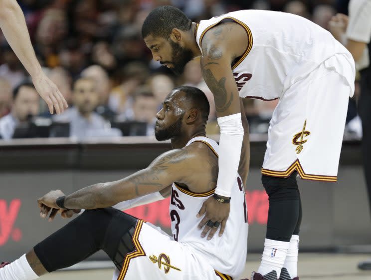 Kyrie Irving and LeBron James in April, before they knew how funny this would look. (AP)