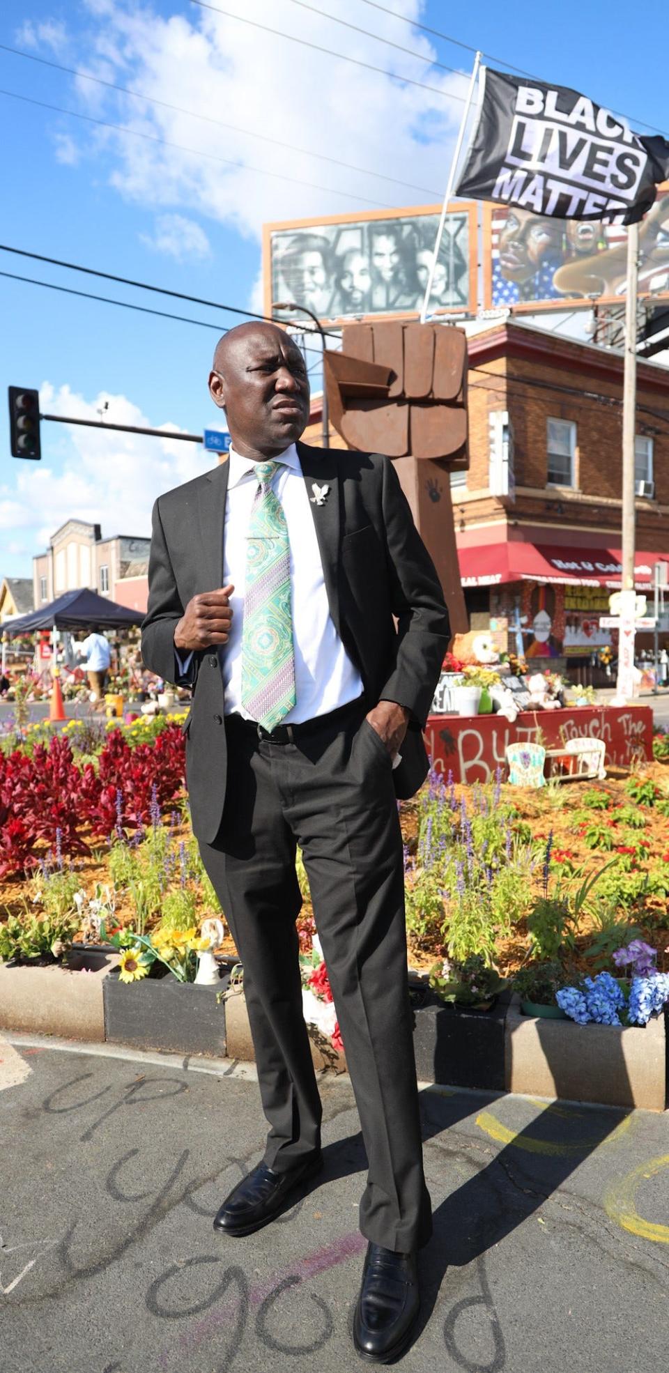 Civil Rights Attorney Ben Crump stands outside a  memorial for the late George Floyd, who died on May 25 in Minneapolis, Minnesota, while under arrest for allegedly passing counterfeit money.