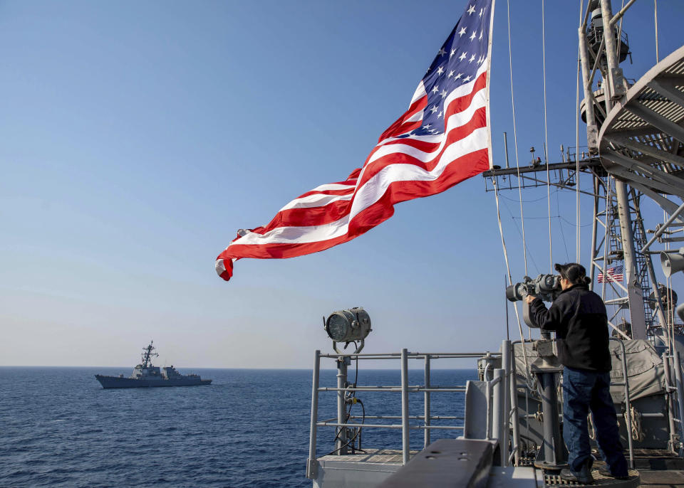 In this photo from the U.S. Navy, the Ticonderoga-class guided-missile cruiser USS Leyte Gulf sails with the Arleigh Burke-class guided-missile destroyer USS Truxtun as part of the Juniper Oak exercise with Israel in the Mediterranean Sea, Tuesday, Jan. 24, 2023. Iran has enough highly enriched uranium to build "several" nuclear weapons if it chooses, the United Nations' top nuclear official is now warning. But diplomatic efforts aimed at again limiting its atomic program seem more unlikely than ever before as Tehran arms Russia in its war on Ukraine and as unrest shakes the Islamic Republic. The Juniper Oak exercise comes amid the tension. (Petty Officer 2nd Class Christine Montgomery/U.S. Navy via AP)