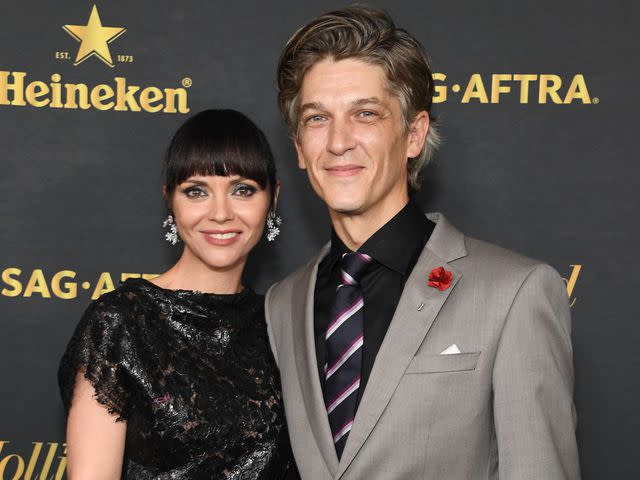 <p>Jon Kopaloff/Getty </p> Christina Ricci and Mark Hampton attend a Primetime Emmy Awards party in September 2022.