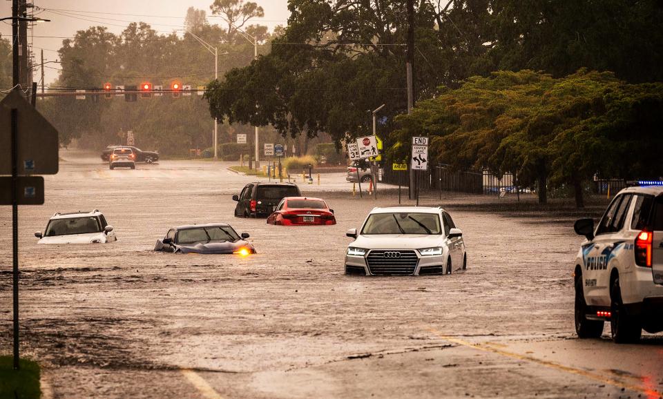 Flash street flooding on Bahia Vista St. adjacent Sarasota High School Tuesday afternoon, June 11, 2024.