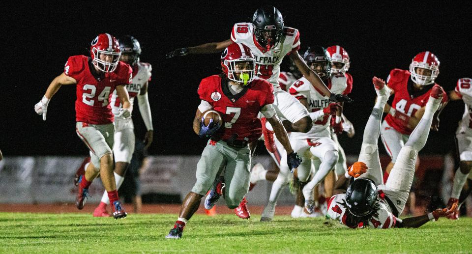 Andre Devine of North Fort Myers breaks out for a huge gain on a kick off return during a game against South Fort Myers Friday, Sept. 8, 2023. South won.