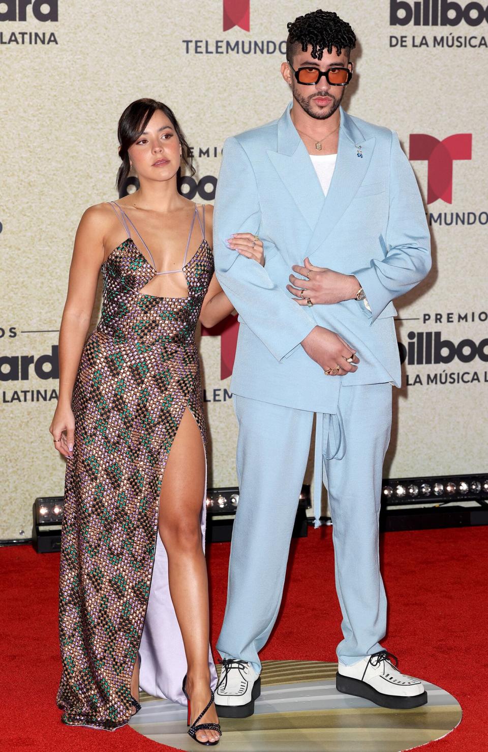 Gabriela Berlingeri, Bad Bunny on the red carpet at the Watsco Center in Coral Gables, FL on September 23, 2021