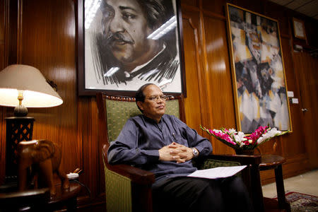 Bangladesh's central bank Governor Atiur Rahman poses inside his office in Dhaka, October 2, 2013. REUTERS/Andrew Biraj/File Photo