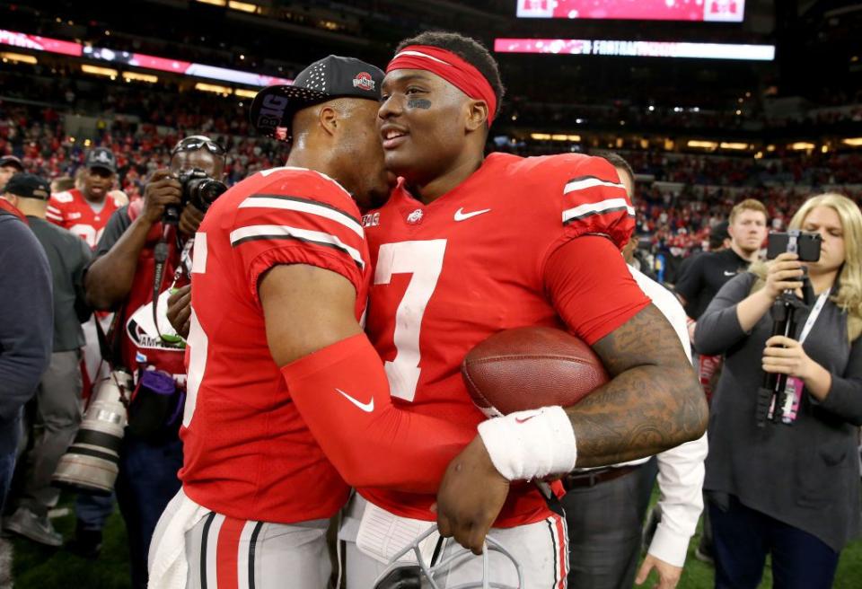 INDIANAPOLIS, IN - DECEMBER 01:  Dwayne Haskins Jr. #7 of the Ohio State Buckeyes celebrates with his teammate after defeating the Northwestern Wildcats during the Big Ten Championship at Lucas Oil Stadium on December 1, 2018 in Indianapolis, Indiana.  (Photo by Andy Lyons/Getty Images)