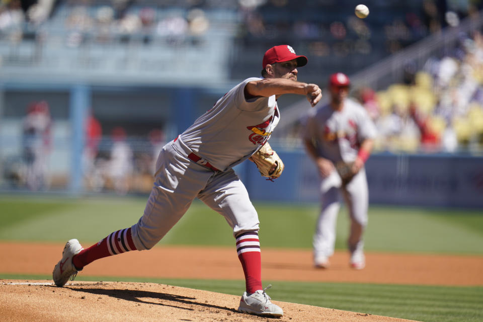 St. Louis Cardinals starting pitcher Adam Wainwright throws against the Los Angeles Dodgers during the first inning of a baseball game Sunday, Sept. 25, 2022, in Los Angeles. (AP Photo/Jae C. Hong)