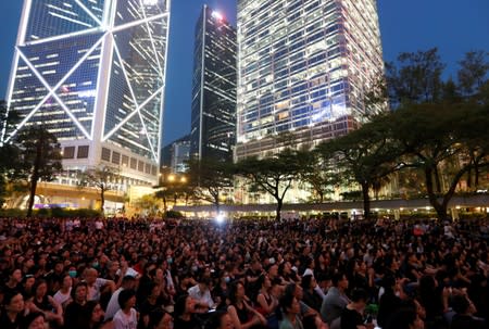 People attend a rally in support of demonstrators protesting against proposed extradition bill with China, in Hong Kong