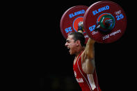 LONDON, ENGLAND - JULY 29: Valentin Hristov of Azerbaijan competes in the Men's 56kg Weightlifting on Day 2 of the London 2012 Olympic Games at ExCeL on July 29, 2012 in London, England. (Photo by Laurence Griffiths/Getty Images)