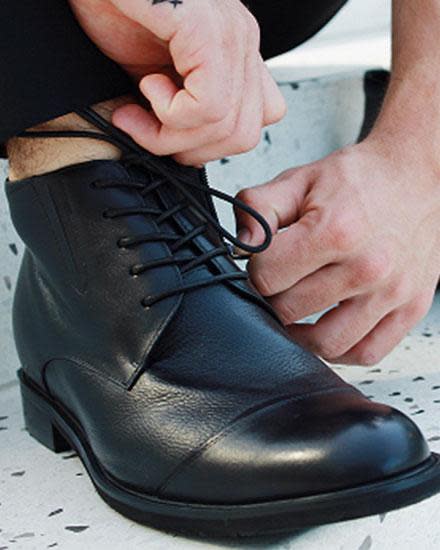 Australian men wear platform shoes to appear taller