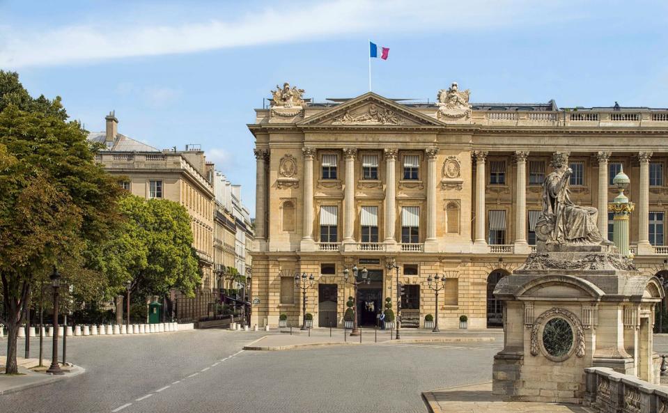 a building with a statue in front of it