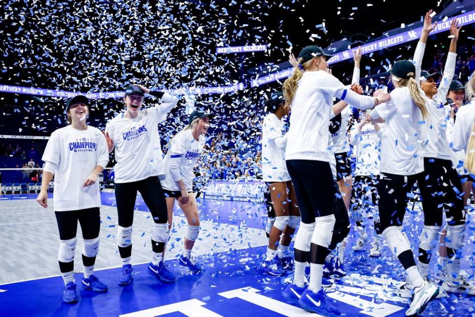 The Kentucky volleyball team celebrates winning the outright SEC championship with a sweep of Florida on Saturday at Rupp Arena. UK Athletics