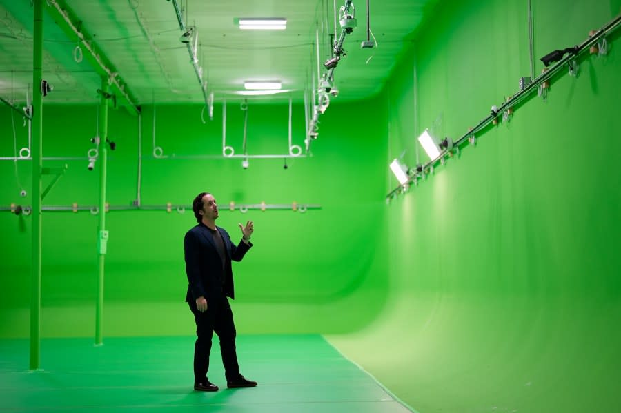 Rob Huberty, Chief Operating Officer and Co-Founder of ZeroEyes, talks about the use of artificial intelligence with surveillance cameras to identify visible guns at the company’s greenscreen lab, Friday, May 10, 2024, in Conshohocken, Pa. (AP Photo/Matt Slocum)