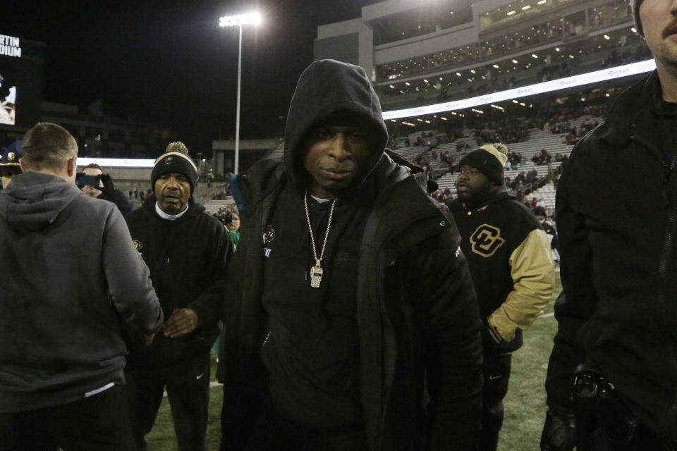 FILE - Colorado head coach Deion Sanders walks on the field after an NCAA college football game against Washington State, Friday, Nov. 17, 2023, in Pullman, Wash. With a roster that included 86 newcomers and just 12 holdovers, the Buffaloes lost six straight to finish 4-8. (AP Photo/Young Kwak, File)