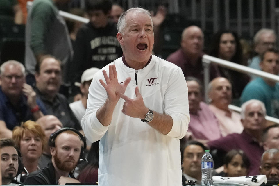 FILE - Virginia Tech head coach Mike Young gestures during the first half of an NCAA college basketball game against Miami , Tuesday, Jan. 31, 2023, in Coral Gables, Fla. (AP Photo/Marta Lavandier, File)