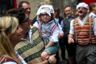 Monty Python fans dressed as the Gumbys gather in an attempt to set the world record for the largest gathering of people dressed as Gumbys as a part of the 50th anniversary of Monty Python's Flying Circus at the Roundhouse in London