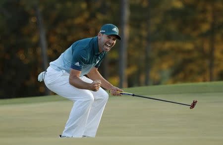 Sergio Garcia of Spain celebrates winning the Masters with a putt on the 18th green during a playoff against Justin Rose of England in the final round of the 2017 Masters golf tournament at Augusta National Golf Club in Augusta, Georgia, U.S., April 9, 2017. REUTERS/Brian Snyder