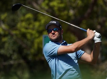 Mar 11, 2018; Palm Harbor, FL, USA; Corey Conners tees off on the 5th during the final round of the Valspar Championship golf tournament at Innisbrook Resort - Copperhead Course. Jasen Vinlove-USA TODAY Sports