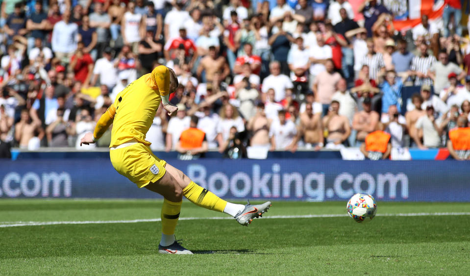 England goalkeeper Jordan Pickford scores a penalty during the shootout in the Nations League Third Place Play-Off at Estadio D. Alfonso Henriques, Guimaraes.