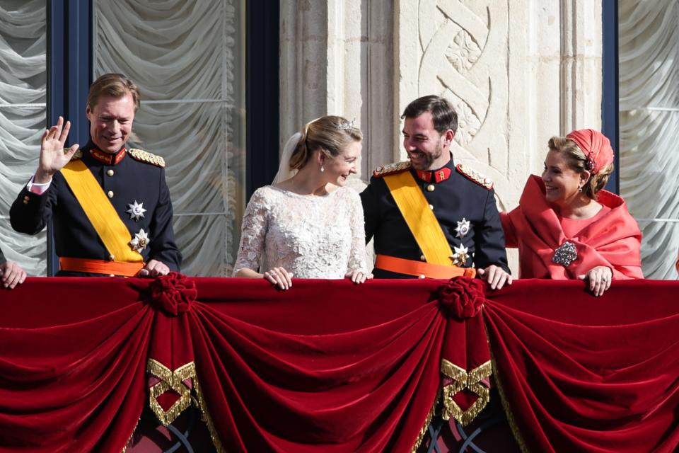 LUXEMBOURG - OCTOBER 20: (NO SALES, NO ARCHIVE) In this handout image provided by the Grand-Ducal Court of Luxembourg, Grand Duke Henri of Luxembourg, Princess Stephanie of Luxembourg, Prince Guillaume of Luxembourgand Grand Duchess Maria Teresa of Luxembourg wave from the balcony of the Grand-Ducal Palace after Prince Guillaume Of Luxembourg & Countess Stephanie de Lannoy's wedding ceremony at the Cathedral of our Lady of Luxembourg on October 20, 2012 in Luxembourg, Luxembourg. The 30-year-old hereditary Grand Duke of Luxembourg is the last hereditary Prince in Europe to get married, marrying his 28-year old Belgian Countess bride in a lavish 2-day ceremony. (Photo by Grand-Ducal Court of Luxembourg via Getty Images)