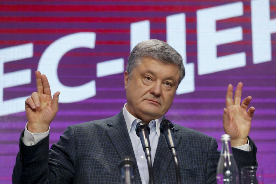 FILE In this file photo taken on Sunday, March 31, 2019, Ukrainian President Petro Poroshenko gestures while speaking at his headquarters after the presidential election in Kiev, Ukraine. Over recent years Ukraine has suffered from an economic meltdown and alleged endemic corruption, which will be great challenges for whom ever wins the upcoming runoff presidential election in three weeks' time. (AP Photo/Efrem Lukatsky, File)