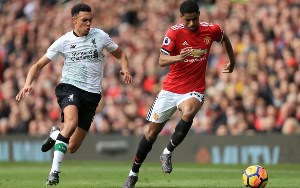 The brothers of Trent Alexander-Arnold, right, and Marcus Rashford were victims of a vviolent robbery in Moss Side on Saturday morning - Offside