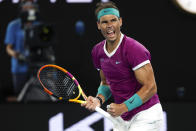 Rafael Nadal of Spain reacts after winning the first set against Matteo Berrettini of Italy during their semifinal match at the Australian Open tennis championships in Melbourne, Australia, Friday, Jan. 28, 2022. (AP Photo/Hamish Blair)