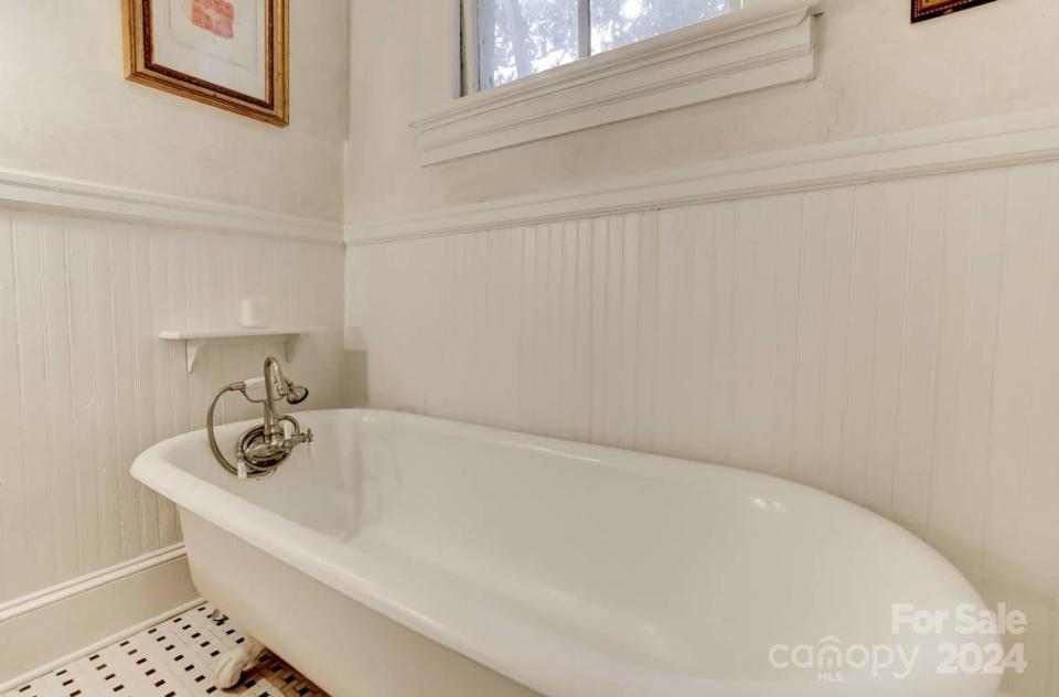 The home has reconditioned claw foot tubs.