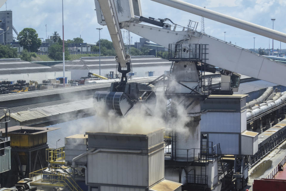 FILE - Grain is offloaded from the Eaubonne bulk carrier ship after it docked in the port of Mombasa, Kenya on Nov. 26, 2022. Senior U.N. officials hosted Russian envoys in Geneva on Monday, March 13, 2023 in a bid to extend an export agreement amid Moscow's invasion of Ukraine and prevent a potential new spike in world food prices. Despite being at war, Ukraine and Russia struck a deal last July that allows Ukraine — one of the world’s key breadbaskets — to ship grain from its Black Sea ports and permits Russia to export food and fertilizers. (AP Photo/Gideon Maundu, File)