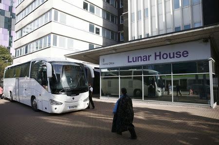 A coach carrying the first group of unaccompanied minors from the Jungle migrant camp in Calais to be brought to Britain arrives at an immigration centre in Croydon, south London, October 17, 2016. REUTERS/Peter Nicholls