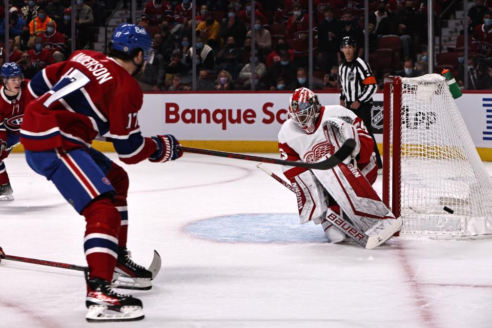 Detroit Red Wings goaltender Thomas Greiss (29) makes a save against Montreal Canadiens right wing Josh Anderson (17) during the first period at Bell Centre on Saturday, Oct. 23, 2021.