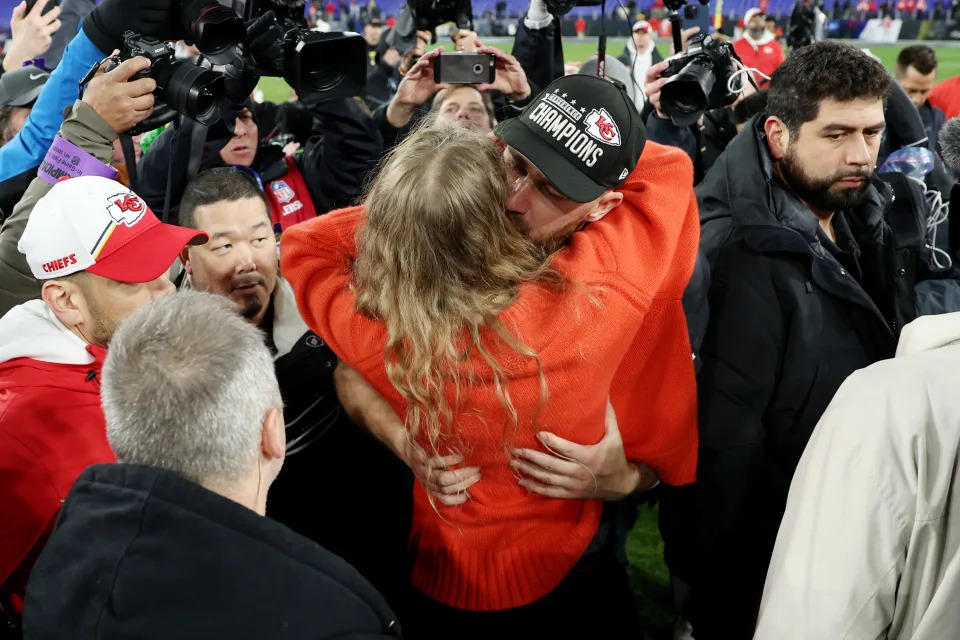 BALTIMORE, MARYLAND - JANUARY 28: Travis Kelce #87 of the Kansas City Chiefs celebrates with Taylor Swift after a 17-10 victory against the Baltimore Ravens in the AFC Championship Game at M&T Bank Stadium on January 28, 2024 in Baltimore, Maryland. (Photo by Patrick Smith/Getty Images)