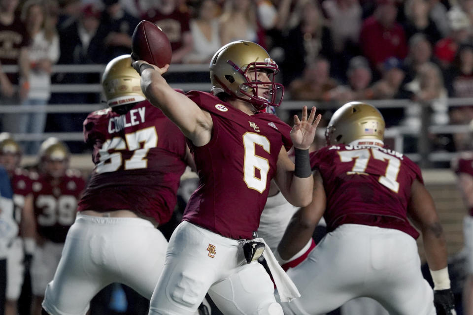 Boston College quarterback Dennis Grosel (6) looks to pass during the first half of an NCAA college football game against the North Carolina State, Saturday, Oct. 16, 2021, in Boston. (AP Photo/Mary Schwalm)