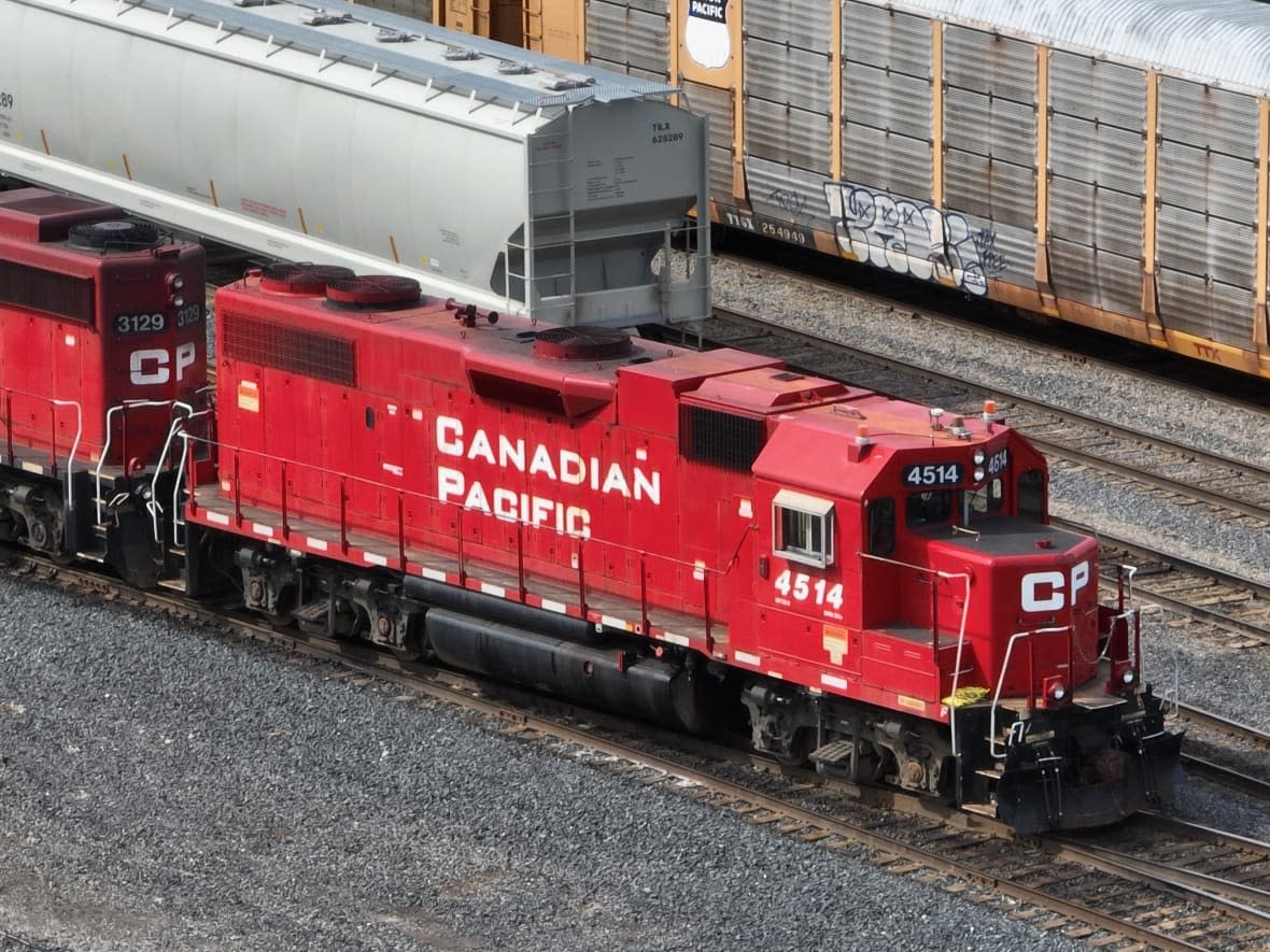 Peel Regional Police say a woman was struck by a Canadian Pacific Railway train around 6 a.m. in the area of Dundas Street East and Cawthra Road near Cooksville GO Station. (Patrick Morrell/CBC - image credit)