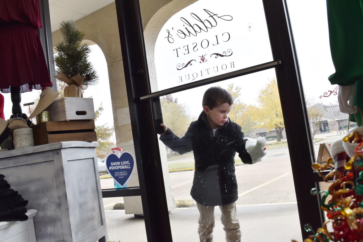 In 2018, Dean Wills who was five years old at the time, cleaned the glass door of Addie's Closet Boutique before his mother, Brandy Watkins Wills, opened for business on Small Business Saturday. Even now, Dean takes responsibility for cleaning the store and what he calls tinkering, said Wills. The women's clothing boutique is now located at 4002 Jackson Street, Unit A.