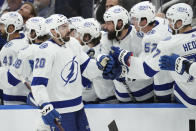 Tampa Bay Lightning left wing Nicholas Paul (20) is congratulated for his goal against the Toronto Maple Leafs during the second period in Game 7 of a first-round series in the NHL hockey Stanley Cup playoffs Saturday, May 14, 2022, in Toronto. (Frank Gunn/The Canadian Press via AP)