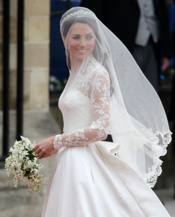 FILE – Kate Middleton arrives at Westminster Abbey at the Royal Wedding in London Friday, April 29, 2011. (AP Photo/Gero Breloer, File)