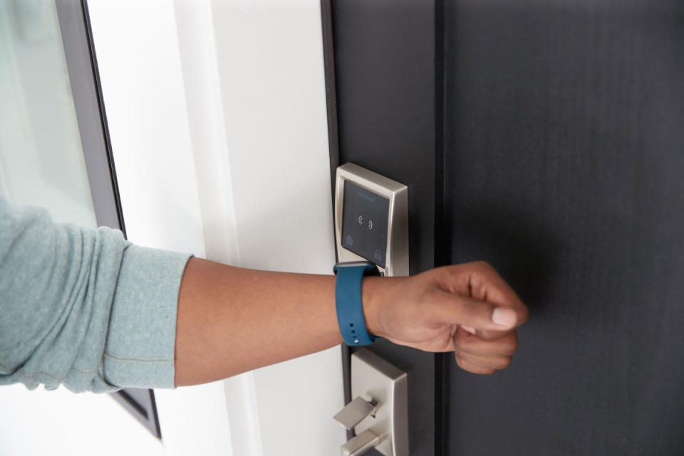 A smart watch unlocks a homeowner's door.<p>Schlage</p>