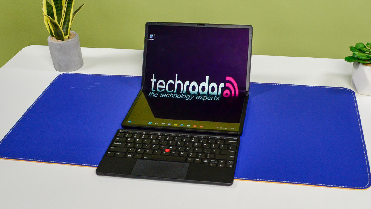  A Lenovo ThinkPad X1 Fold 16 Gen 1 on a white desk. 