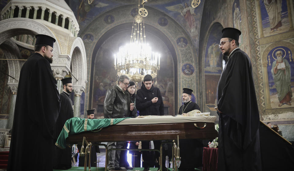 Believers pay their last respects to Bulgarian patriarch Neophyte at the Alexander Nevsky Cathedral in Sofia, Friday, March 15, 2024. National mourning was declared by the Bulgarian government on March 15 and 16 to honour Patriarch Neophyte of Bulgaria. Neophyte who was the first elected head of the Orthodox Church in the post-communist Balkan country, died at a hospital in Sofia on March 13. He was 78. (AP Photo/Valentina Petrova)