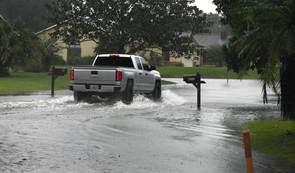 Hurricane Ian left flooded streets in the Lantern Park subdivision north of Titusville.
