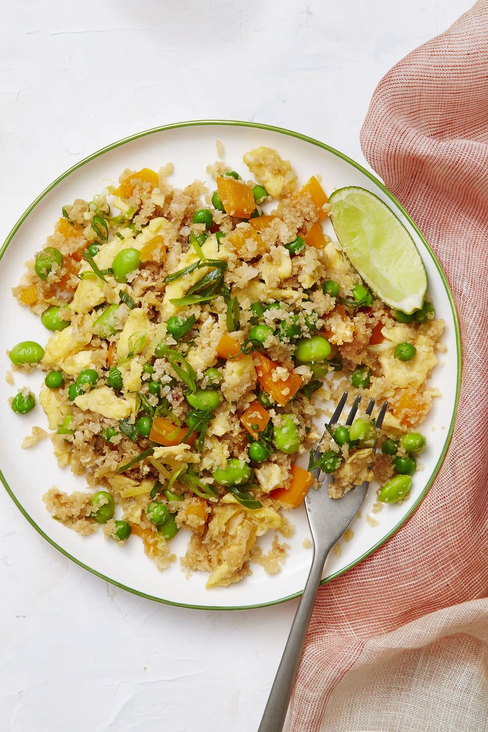 <p>This vegetarian fried "rice" is packed with vegetables and beats takeout any day.</p><p><em><a href="https://www.womansday.com/food-recipes/food-drinks/recipes/a58137/cauliflower-fried-rice-recipe/?visibilityoverride" rel="nofollow noopener" target="_blank" data-ylk="slk:Get the Cauliflower Fried Rice recipe.;elm:context_link;itc:0;sec:content-canvas" class="link ">Get the Cauliflower Fried Rice recipe.</a></em></p>