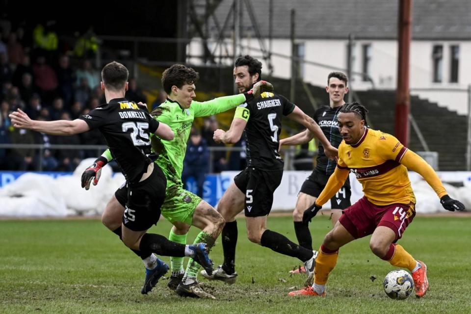 Theo Bair scores to make it 2-2 at Dens Park <i>(Image: SNS)</i>